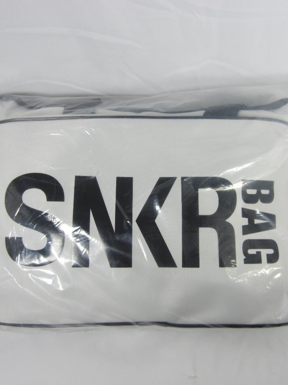 NEW-NEVER OPENED! WHITE SNKR BAG